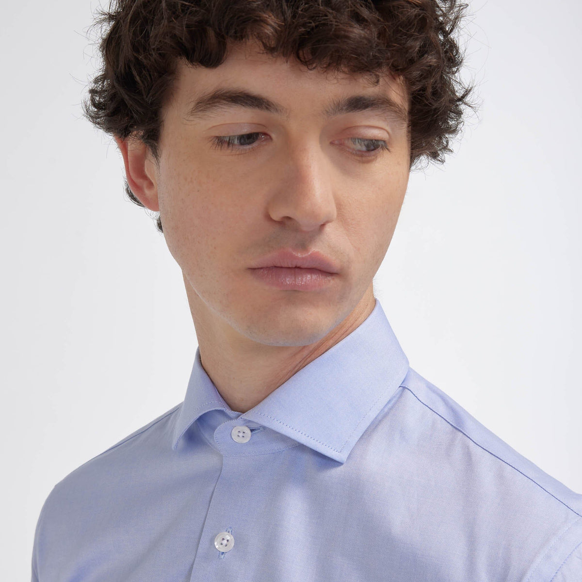 Chemise grande longueur cintrée en oxford bleue
