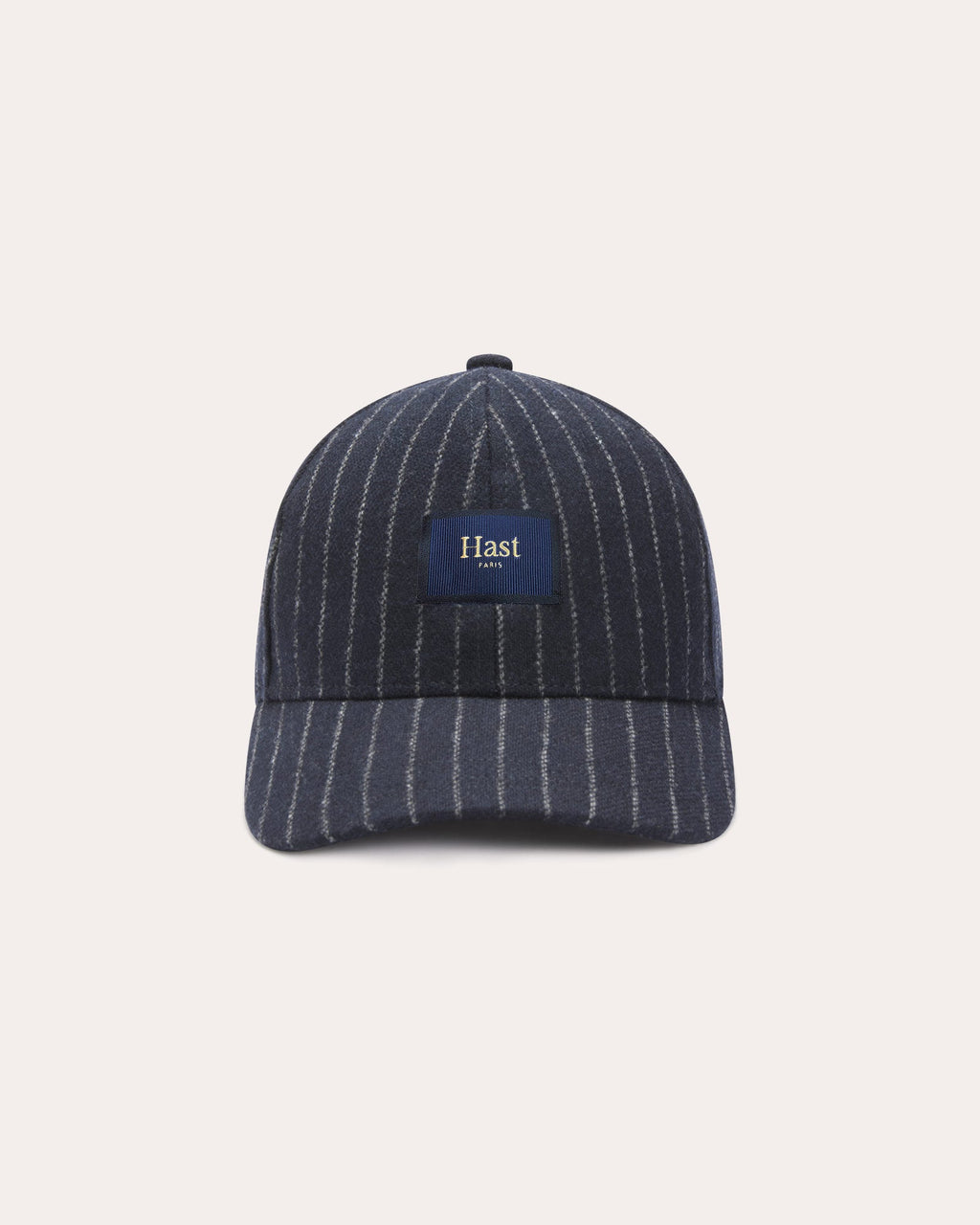 Casquette en laine marine à rayures craie