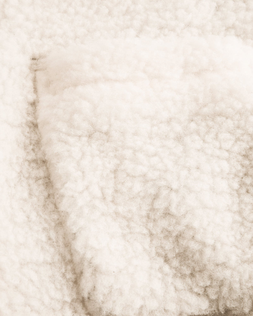 Gilet en laine naturel, détails velours chocolat