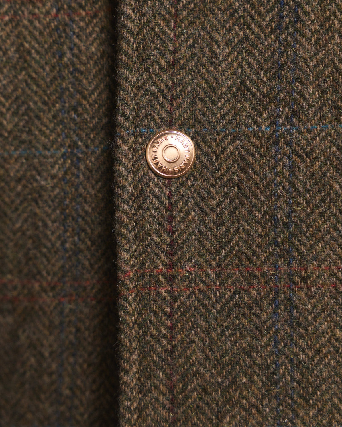Veste en tweed de laine verte à chevrons