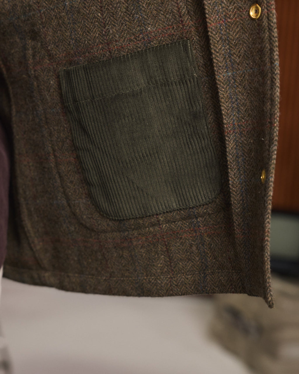 Veste en tweed de laine verte à chevrons
