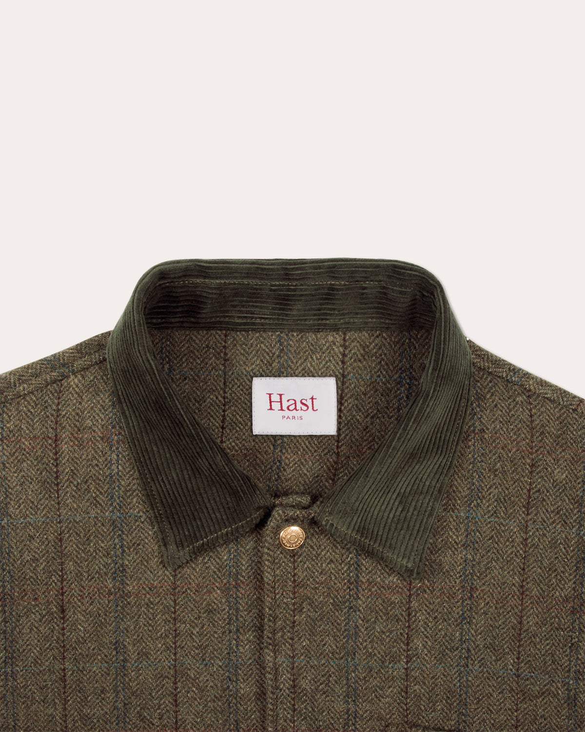 Veste en tweed de laine verte à chevrons